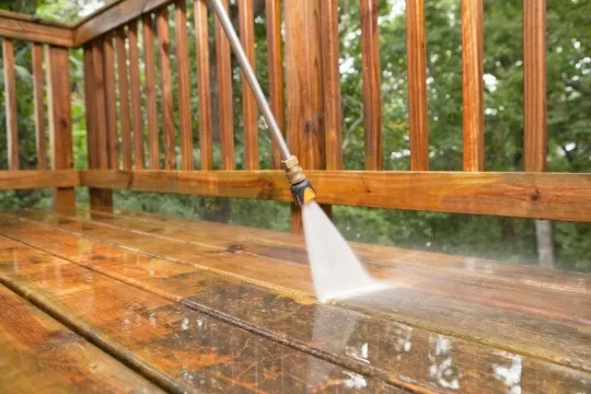 Washing a wet timber deck and balustrade