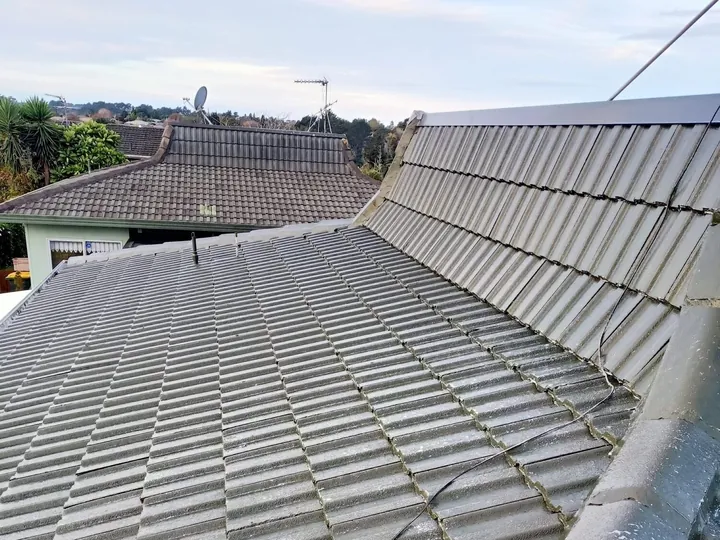 The same tile roof after cleaning, lichen gone